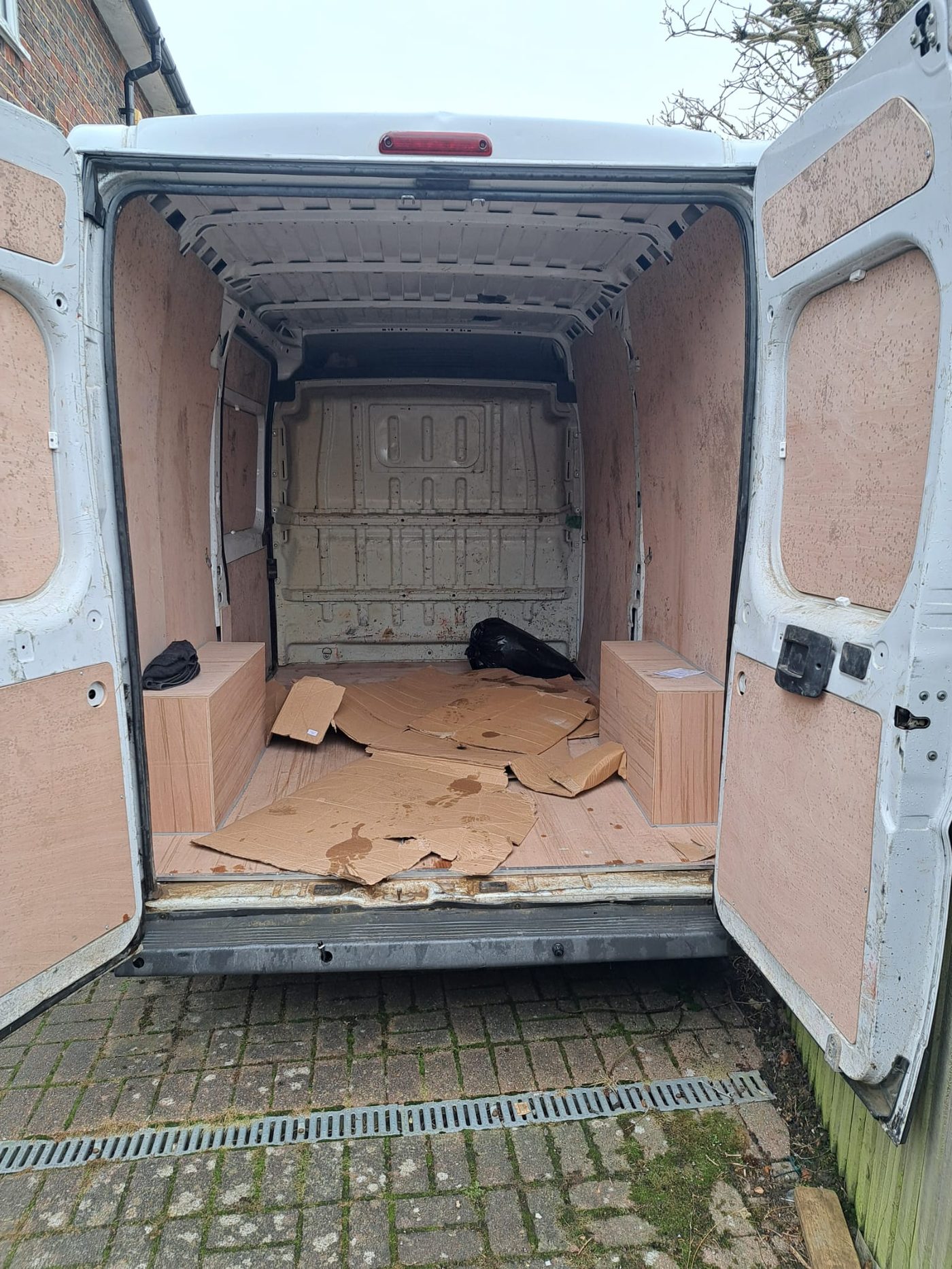 Bea — Mercedes Sprinter van empty interior at the start of the carpentry stage, ply-lined and ready for fit out
