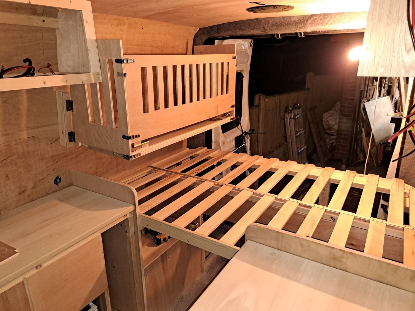Campervan bed slats with hinged folding back rest carpentry in progress