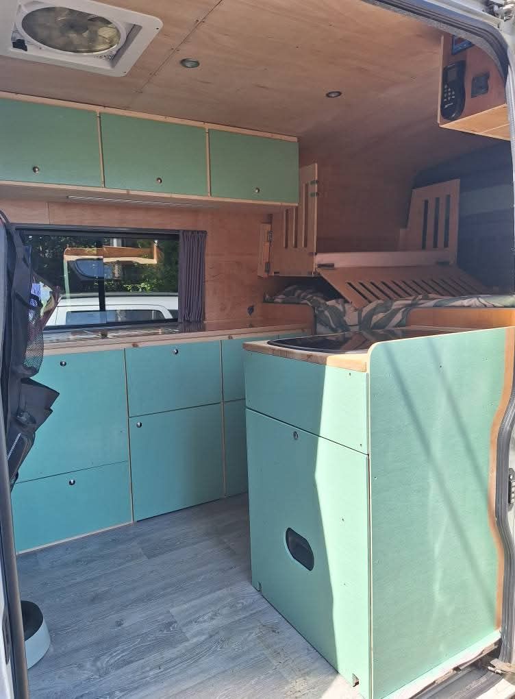 Campervan kitchen carpentry with painted ply 